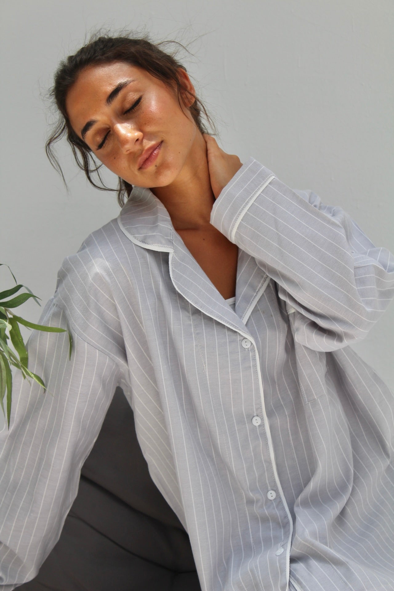grey stripe pajama with white pipe