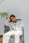 off white Pajama with black pipe